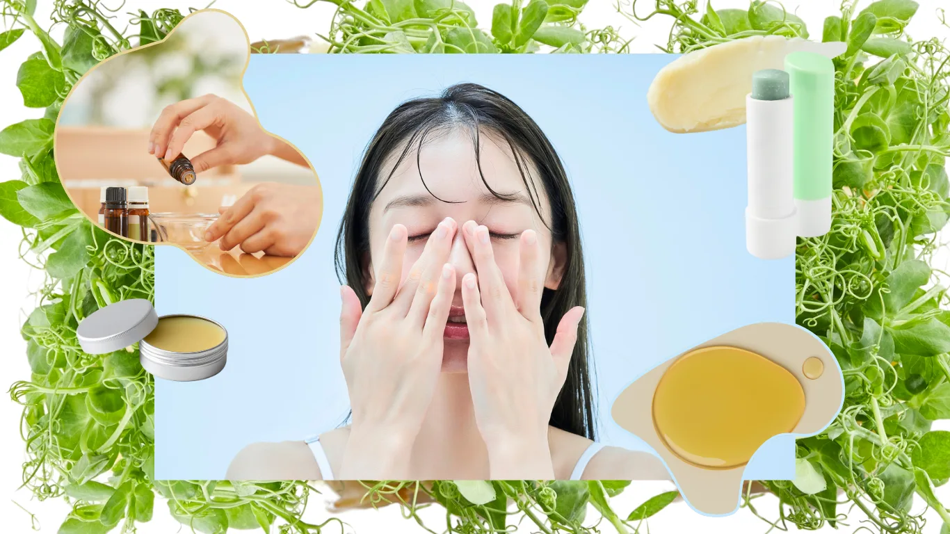 Woman pressing both hands to her face, framed by pea shoots and cut-outs of a dropper bottle, a balm tin and a lip-balm stick
