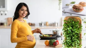 Smiling pregnant woman in a mustard top stirring vegetables in a pan, beside a bagel sandwich with greens and a tray of radish shoots