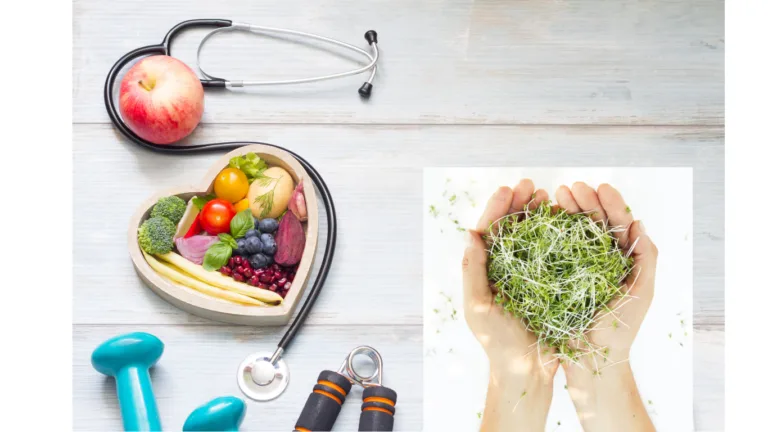 Flat lay on pale wood of a stethoscope, apple, teal dumbbells, hand grip and a heart-shaped bowl of vegetables and berries, beside an inset of cupped hands holding a mound of cut green sprouts